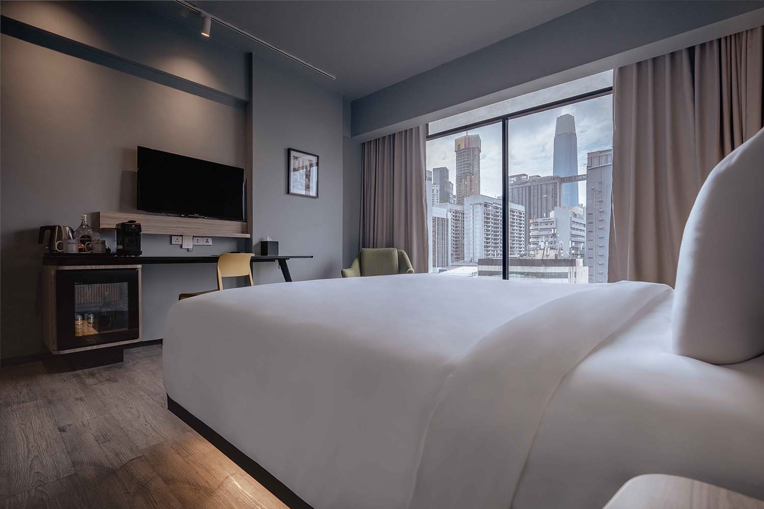 Room with a view – Wake up to sunbeams and city dreams.